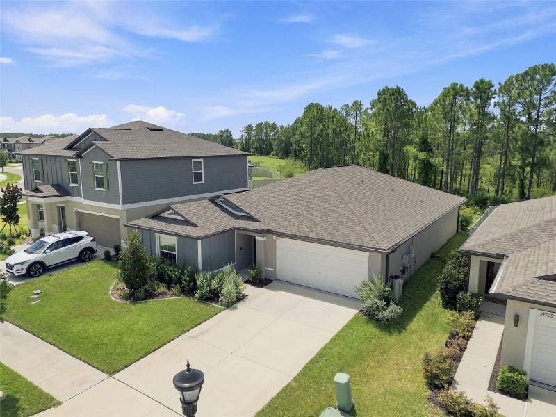 4 bedroom Single Family Residence at 34701 Rainville Loop, Two Rivers Ph B Prcl A1, Zephyrhills — photo 3