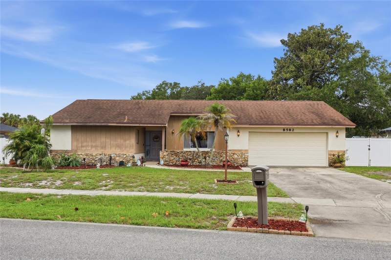 8582 CEDAR COVE DRIVE home for sale in Sand Lake Hills