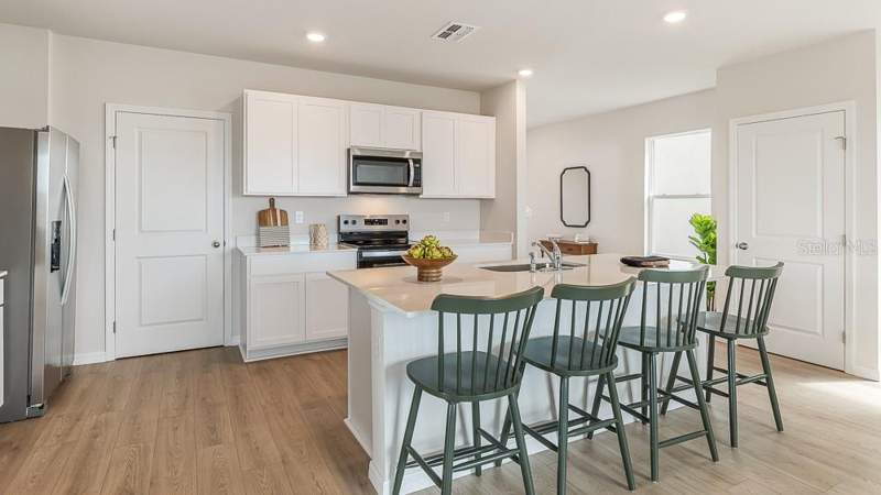 4 bedroom Single Family Residence at 11848 Texoma Court, Bella Lago, Parrish — photo 5