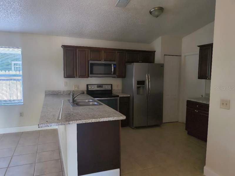4 bedroom Single Family Residence at 1003 Winterberry Lane, Hollytree Village, Orlando — photo 5