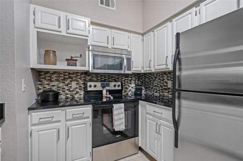 6663 Queens Borough Avenue #104, Orlando FL - photo 7 of 36