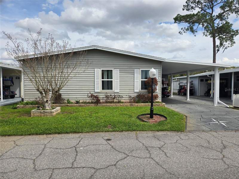 131 VICTORIA DRIVE home for sale in Sweetwater Golf and Tennis Club
