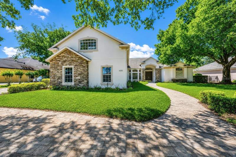 4 bedroom Single Family Residence at 9548 Crown Prince Lane, Windsor Hill, Windermere — photo 2