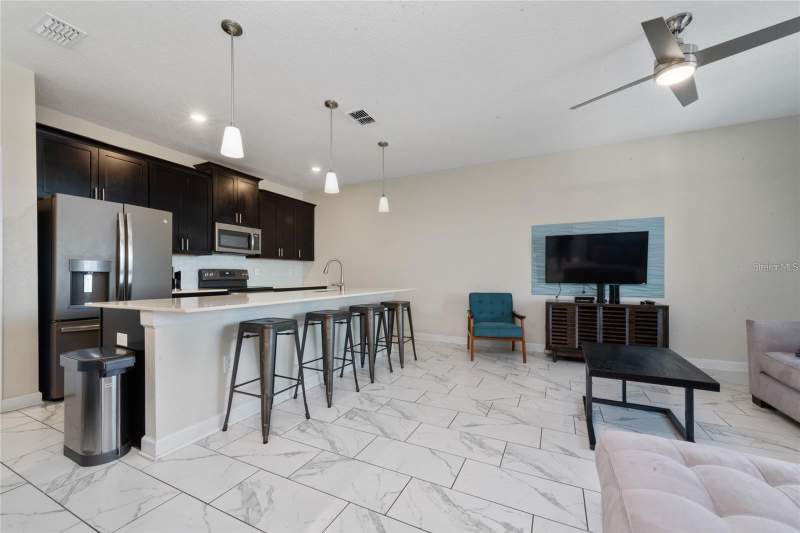 4 bedroom Townhouse at 8932 Stinger Drive, Stoneybrook South Ph J-2 & J-3, Davenport — photo 3