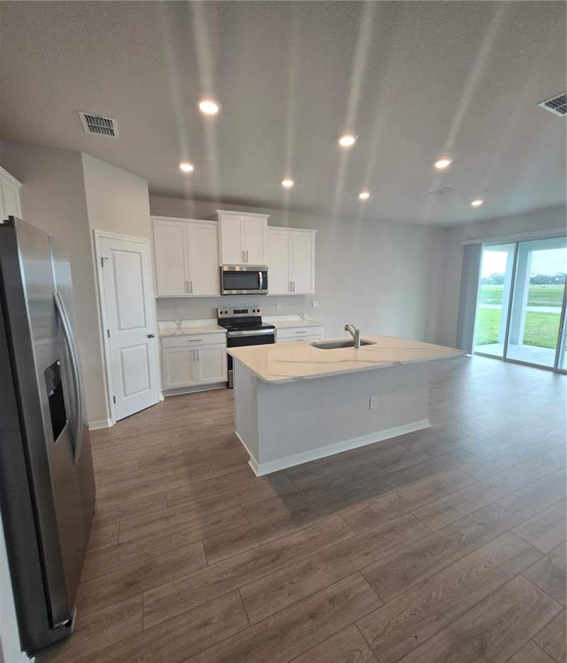 4 bedroom Single Family Residence at 9431 Bella Mar Trail, Seaire, Parrish — photo 3