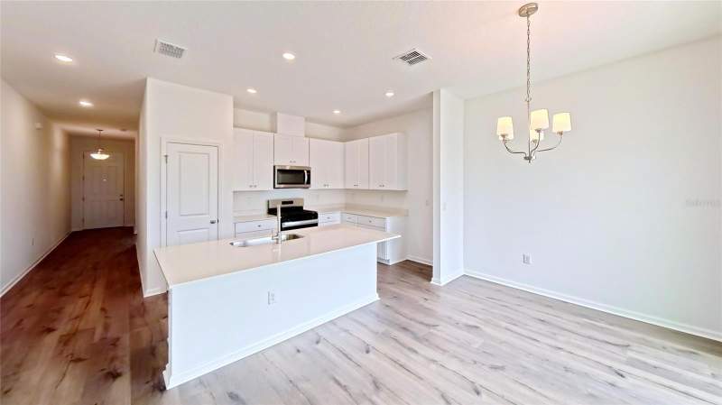 4 bedroom Single Family Residence at 6213 Sanders Grove Circle, Heritage-The Cottages Of Sanders Grove, Leesburg — photo 3