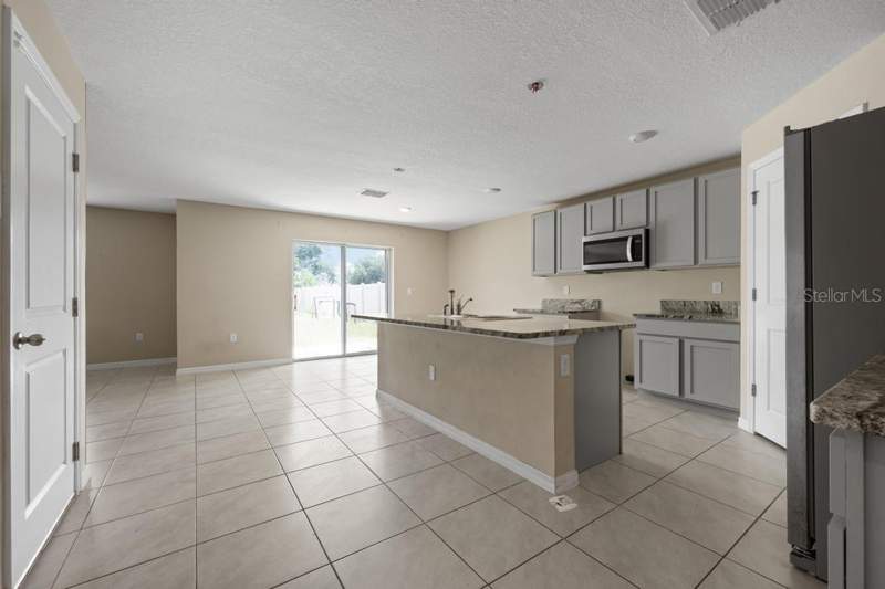4 bedroom Single Family Residence at 5280 Fiddle Fig Avenue, Berry Bay Sub, Wimauma — photo 3