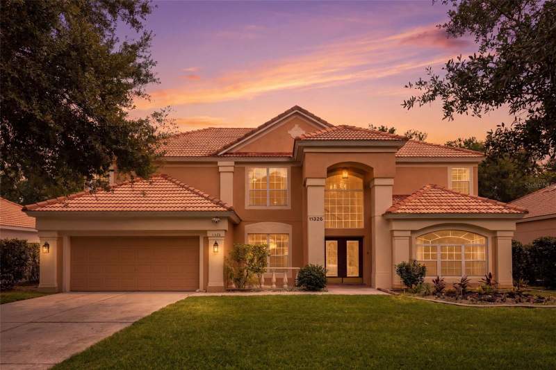5 bedroom Single Family Residence at 11326 Ledgement Lane, Glenmuir 48 39, Windermere — photo 2