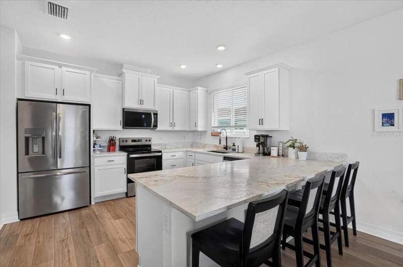 4 bedroom Single Family Residence at 10971 Bluestem Cove, Sawgrass Lakes Ph I-Iii, Parrish — photo 3