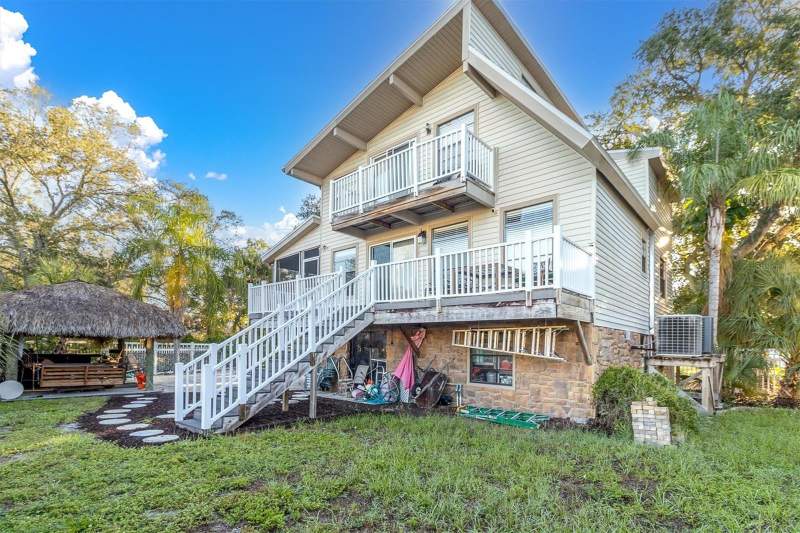 3 bedroom Single Family Residence at 4840 Hummingbird Trail, Blue Jay Woodlands - Ph 3, Palm Harbor — photo 2