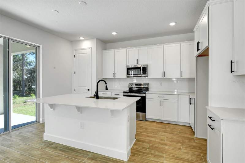 4 bedroom Single Family Residence at 1010 Cloud Ridge Court, Seasons At Wekiva Ridge, Mount Dora — photo 5