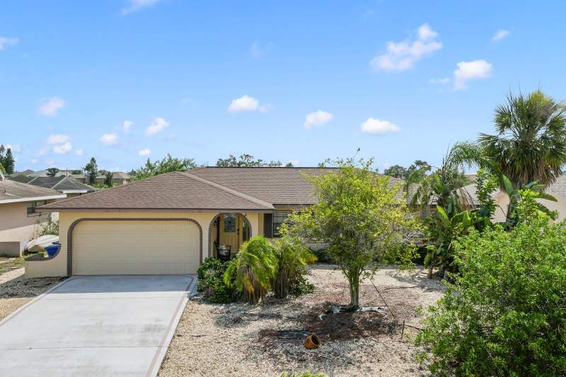 744 FLAMINGO DRIVE home for sale in A Resub Of Pt Of Apollo Beac Homes for Sale: 1 Listing, From $459K