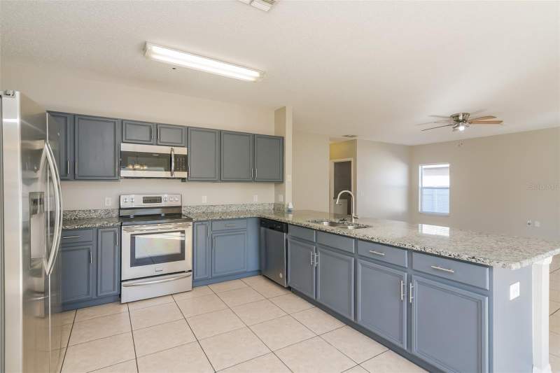 4 bedroom Single Family Residence at 4417 Canopy Court, Banyan Cove At Cypress Woods, Kissimmee — photo 4