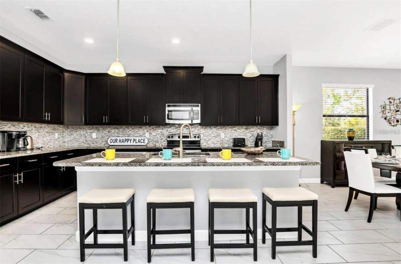 6 bedroom Single Family Residence at 5504 Solterra Circle, Solterra Ph 1, Davenport — photo 4