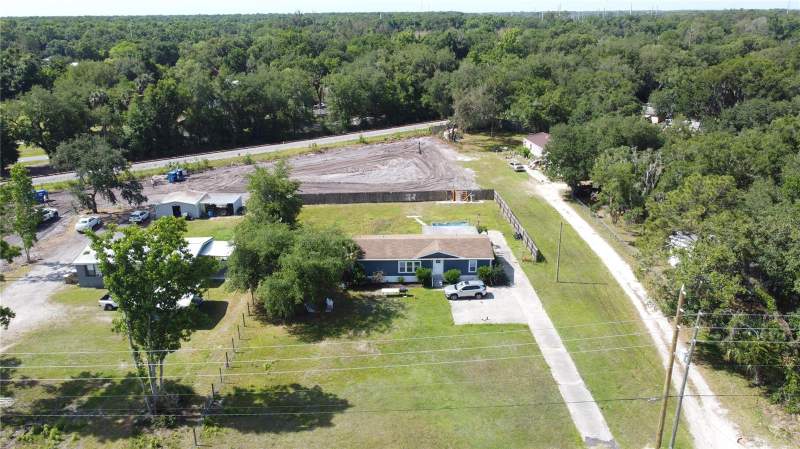 12 bedroom Mobile Home at 6590 OSCEOLA POLK LINE ROAD, ACREAGE & UNREC, DAVENPORT — photo 1