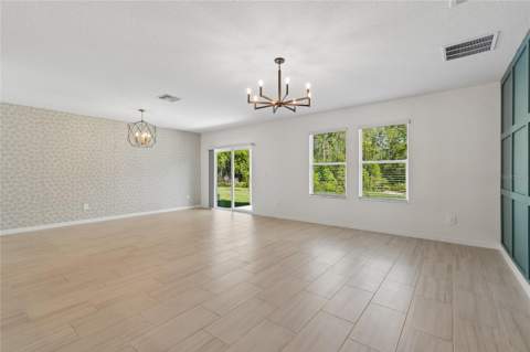 10065 Gentle Rain Drive, Land O Lakes FL - photo 10 of 52