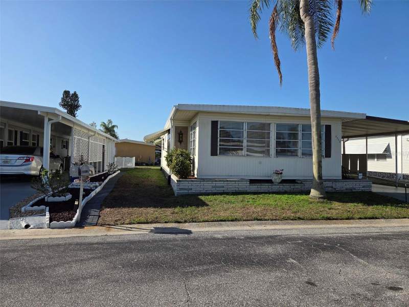 2 bedroom Mobile Home at 3312 Overcup Oak Terrace, Oakwood Manor, Sarasota — photo 2