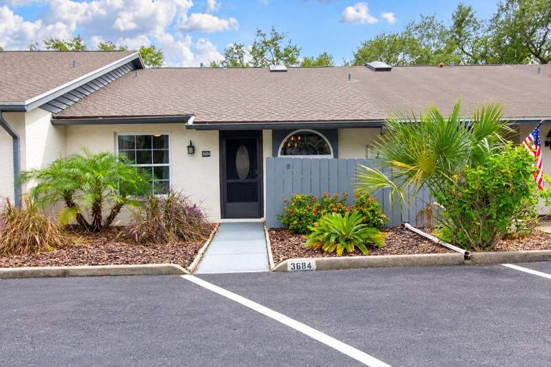 2 bedroom Villa at 3684 Cuernavaca Court, Belle Oak Villas, Largo — photo 1