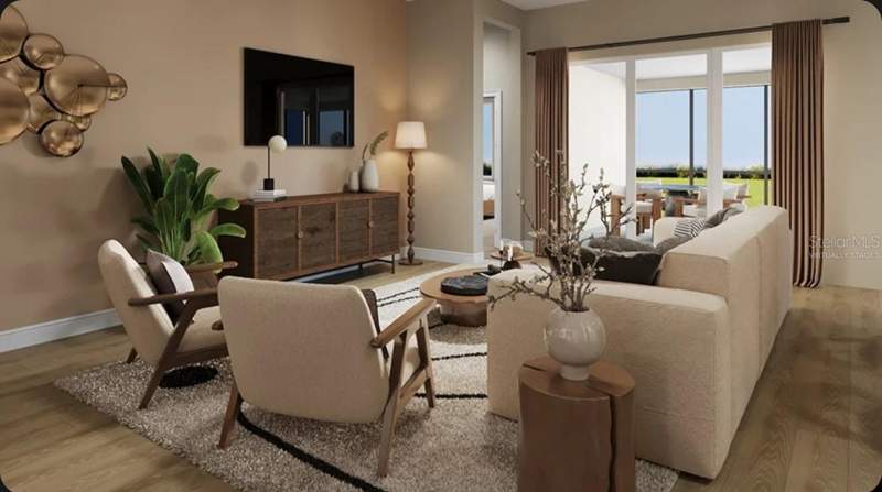 4 bedroom Single Family Residence at 911 ARBOR GREEN TRAIL, ESPLANADE AT CENTER LAKE RANCH, ST CLOUD — photo 3