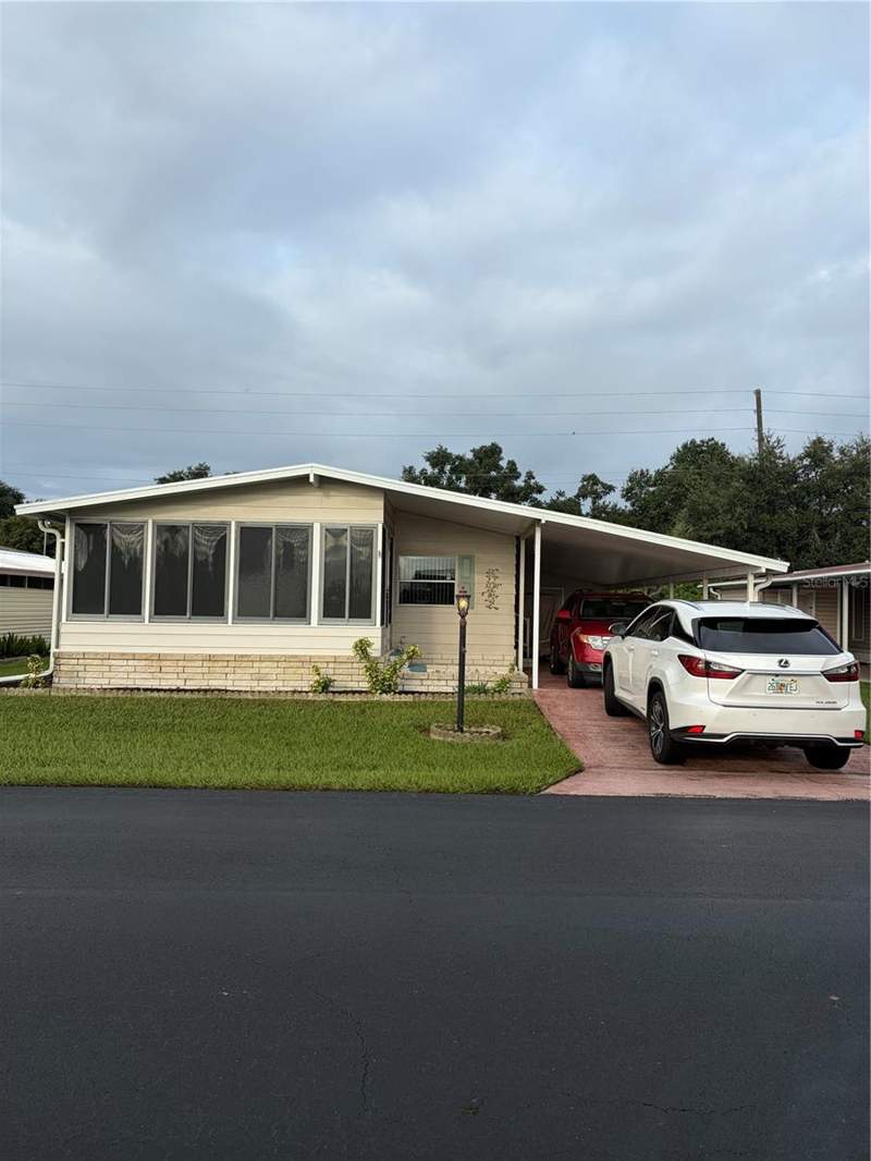2 bedroom Manufactured Home at 193 E Sweet Circle, Orange Manor West Coop Inc, Winter Haven — photo 2