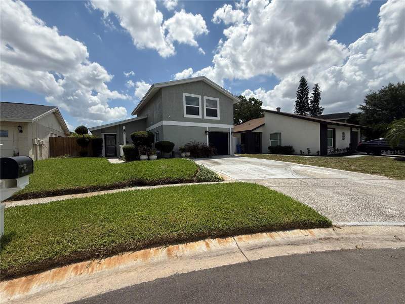 4 bedroom Single Family Residence at 10009 Regal Woods Lane, Mill Pond Village, Tampa — photo 2