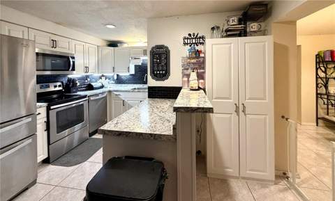 1555 Beacon Drive, Port Charlotte FL - photo 8 of 31