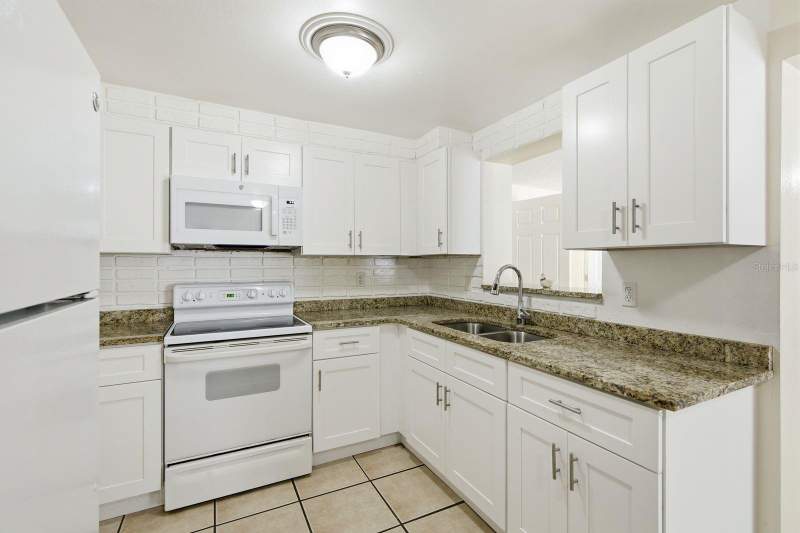 4 bedroom Single Family Residence at 1119 17th Avenue, Ridge Park Estates, Largo — photo 4