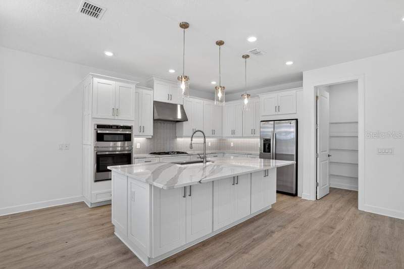 3 bedroom Single Family Residence at 899 ARBOR GREEN TRAIL, ESPLANADE AT CENTER LAKE RANCH, ST CLOUD — photo 5