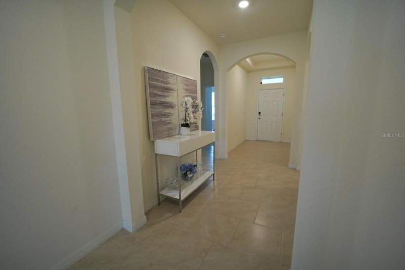 4 bedroom Single Family Residence at 6946 Audobon Osprey Cove, Villages At Harmony Ph 2A, Harmony — photo 3