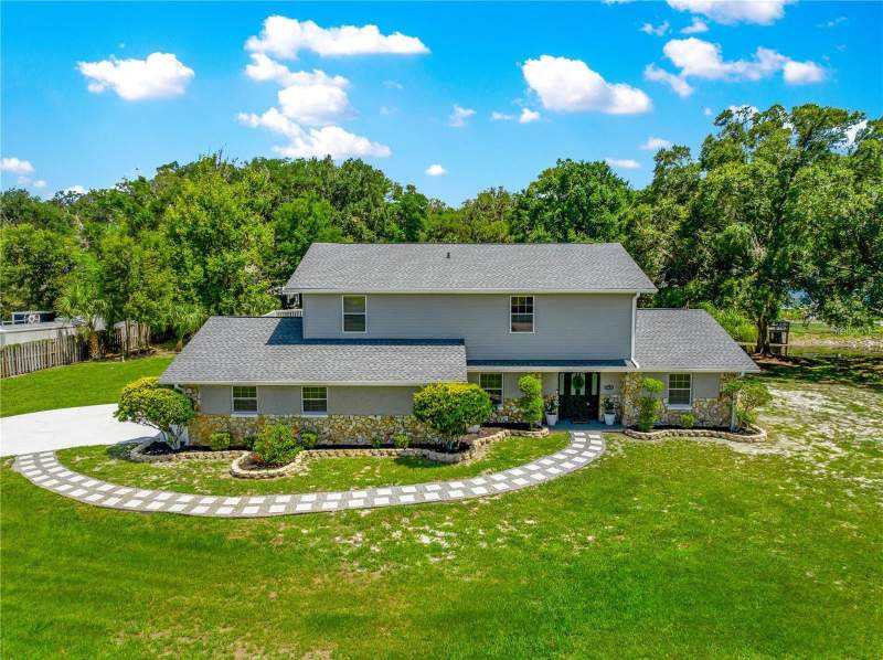 4 bedroom Single Family Residence at 15621 SE 103rd Terrace, Sunset Harbor Isle, Summerfield — photo 2