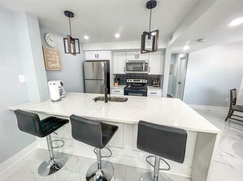 315 Medallion Boulevard #F, Madeira Beach FL - photo 7 of 25