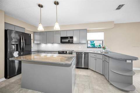 9307 Palm Haven Court, New Port Richey FL - photo 14 of 61