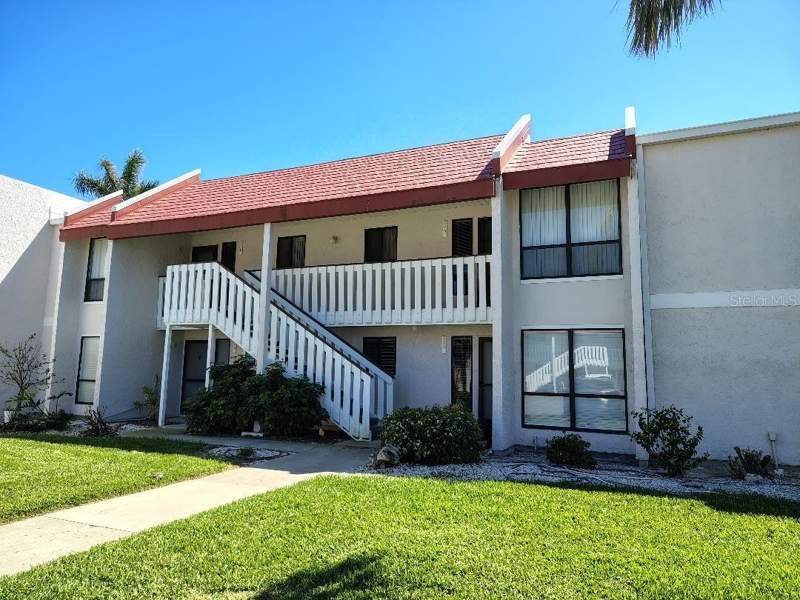 2 bedroom Condominium at 1801 Gulf Drive #125, Runaway Bay, Bradenton Beach — photo 1