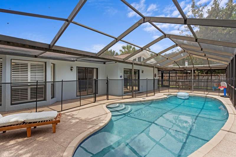 4 bedroom Single Family Residence at 12803 Rain Forest Street, Raintree Terrace Sub W, Temple Terrace — photo 2