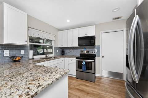 557 Magnolia Avenue, Port Charlotte FL - photo 11 of 43