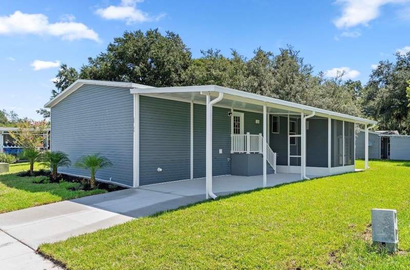 4 bedroom Manufactured Home at 25124 Huckleberry Way, Astatula Meadows Sub, Astatula — photo 2