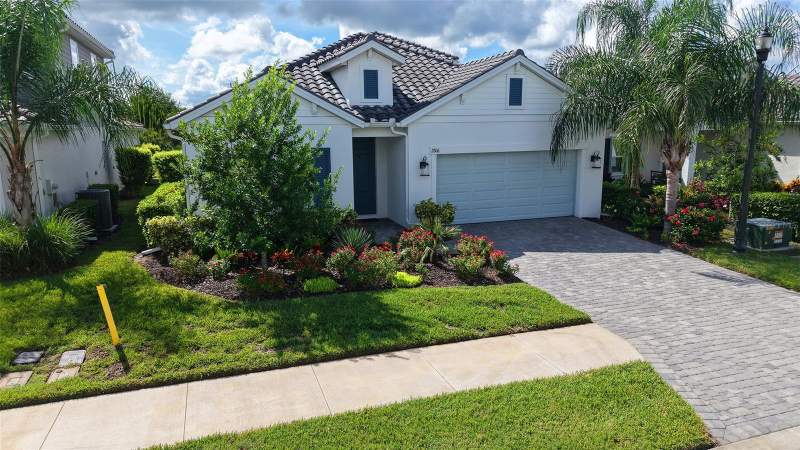 4 bedroom Single Family Residence at 2806 Butterfly Jasmine Trail, Windward At Lakewood Ranch, Sarasota — photo 2