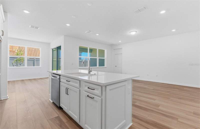 4 bedroom Single Family Residence at 6979 Depue Drive, Vidas Way Legacy Phase 1B, Wesley Chapel — photo 4