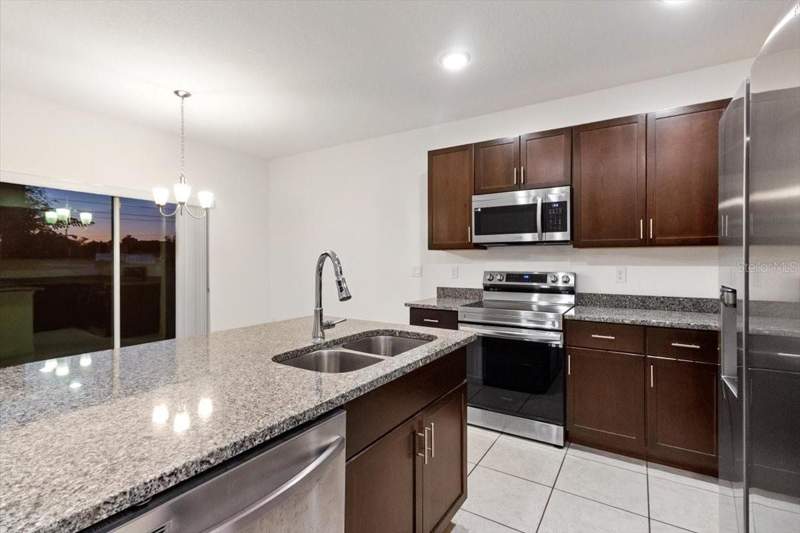 3 bedroom Single Family Residence at 1200 Wahneta Drive, Poinciana Nbrhd 02 West Village 07, Kissimmee — photo 4