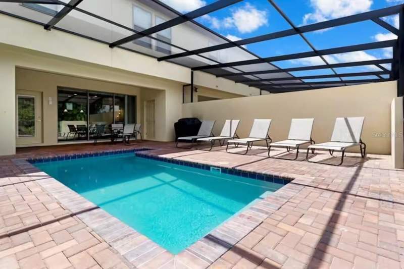 5 bedroom Townhouse at 8887 Geneve Court, Windsor At Westside Ph 2B, Kissimmee — photo 2
