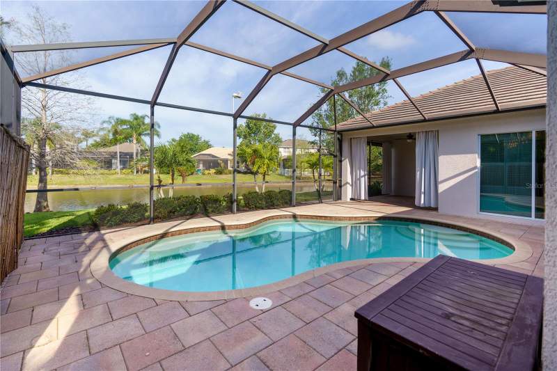 4 bedroom Single Family Residence at 14717 Bowfin Terrace, Greenbrook Village Subphase Ll, Lakewood Ranch — photo 3
