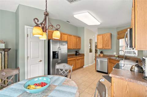 516 Grand Canal Dr, Poinciana FL - photo 13 of 54