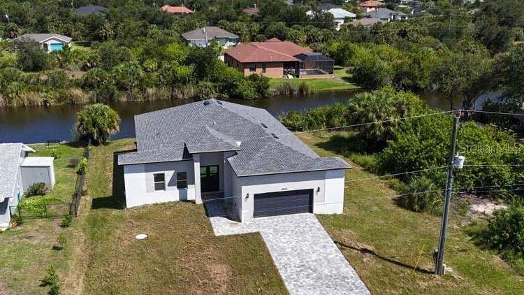 4 bedroom Single Family Residence at 9500 Galaxie Circle, Port Charlotte Sec 071, Port Charlotte — photo 2