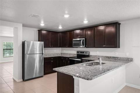 204 Hyacinth Court, Poinciana FL - photo 9 of 37
