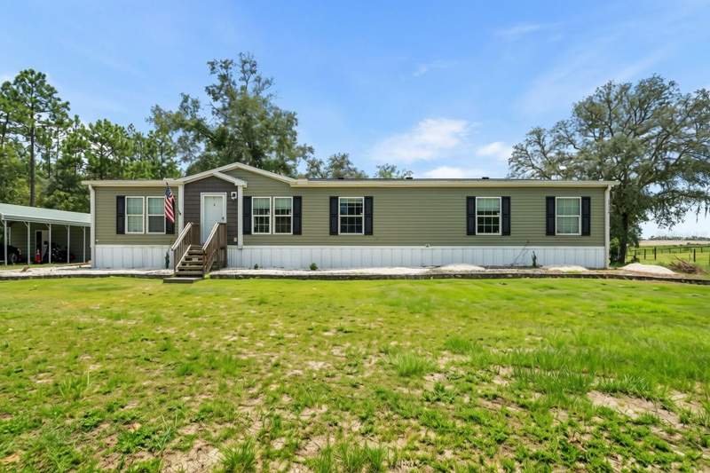 5 bedroom Manufactured Home at 13664 SW 95th Street, Samardaks Cloud-9 Ranchettes, Dunnellon — photo 2