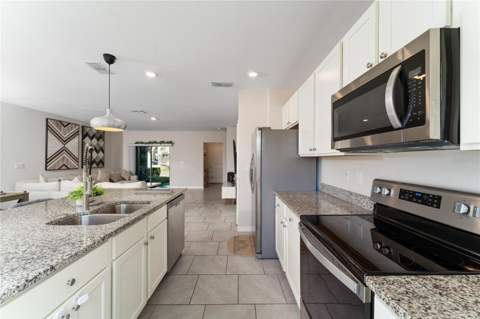 16931 Reseda Alley, Winter Garden FL - photo 7 of 34