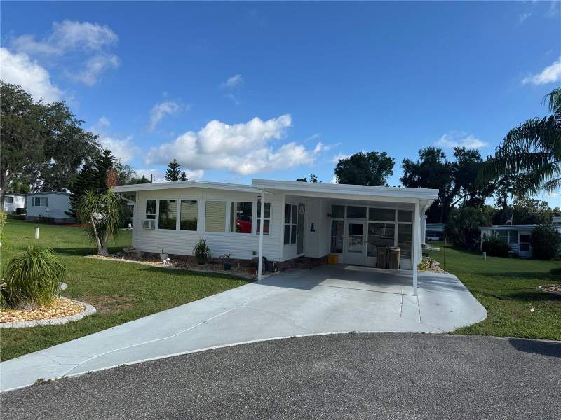 2 bedroom Mobile Home at 102 Tangelo Cove, Hawthorne At Leesburg A Coop, Leesburg — photo 3