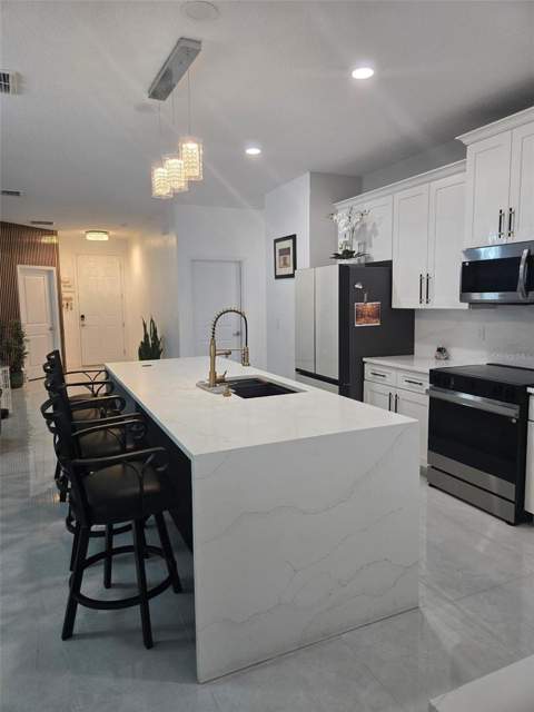 13417 E Delaware Avenue, Astatula FL - photo 10 of 24