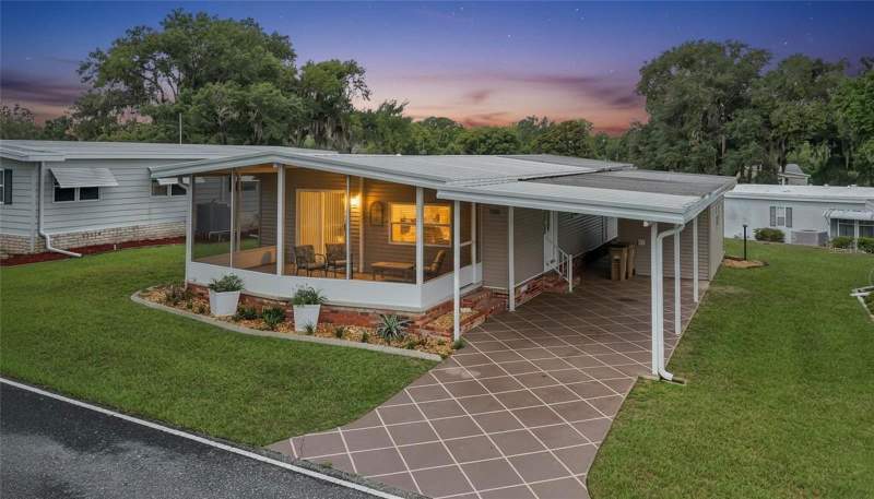 100 PAPAYA COVE home for sale in Hawthorne At Leesburg A Coop