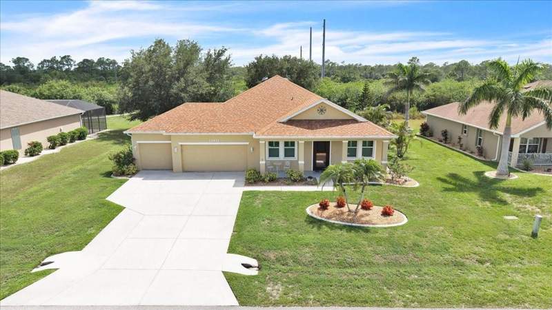 4 bedroom Single Family Residence at 12933 SW PEMBROKE CIRCLE, PEMBROKE SUB, LAKE SUZY — photo 1
